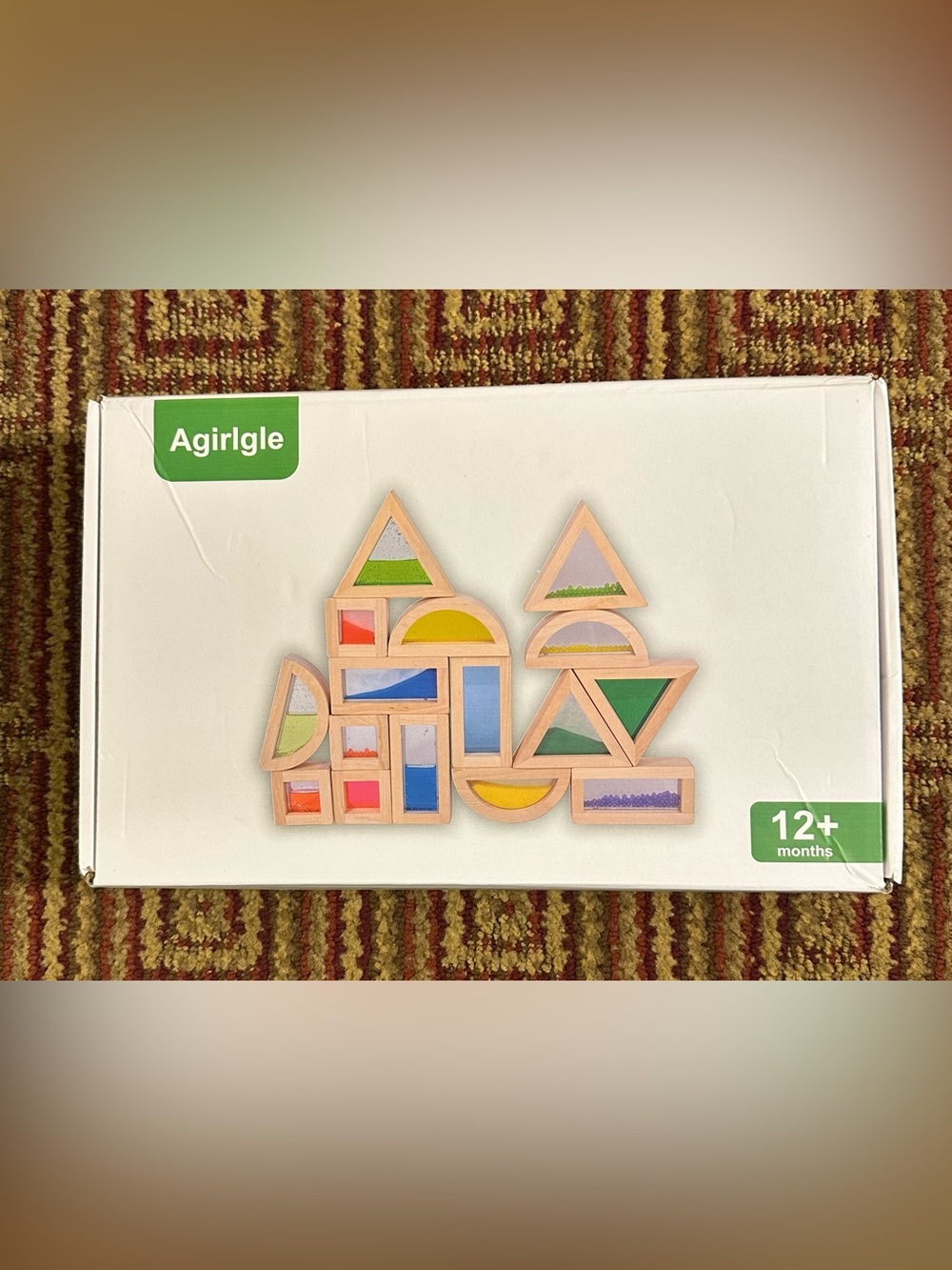 Agirlgle • 16 piece wooden block set •
Filled, all different • in box